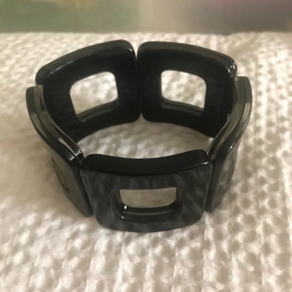 Black resin bracelet.
